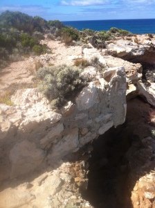 The lighthouse wall hangs off the edge of the cliff - safety first!