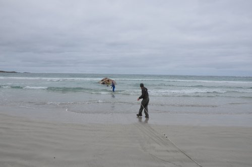 Figure 2. Simon Carter and Guy Williams assisting the tethered snorkeler. Courtesy of Anthony Virag.